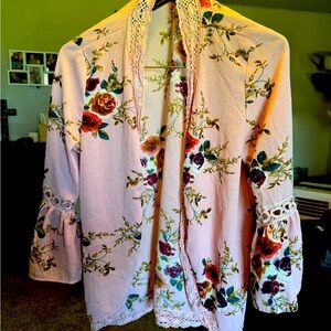 Floral cardigan, fits a medium or large.In great condition!